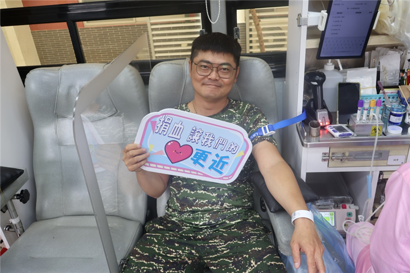 Military personnel enthusiastically donated blood in response to the call.