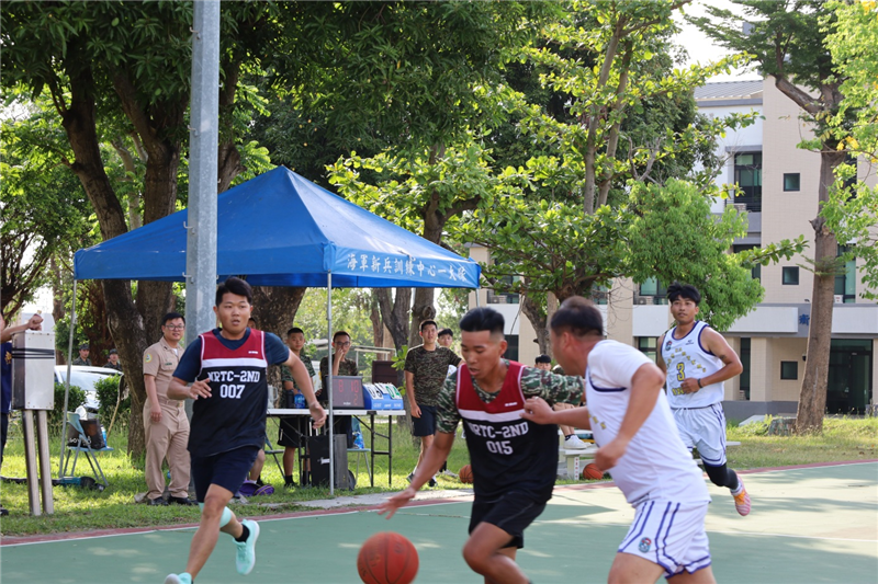 Driving through the basket while challenging the defense
